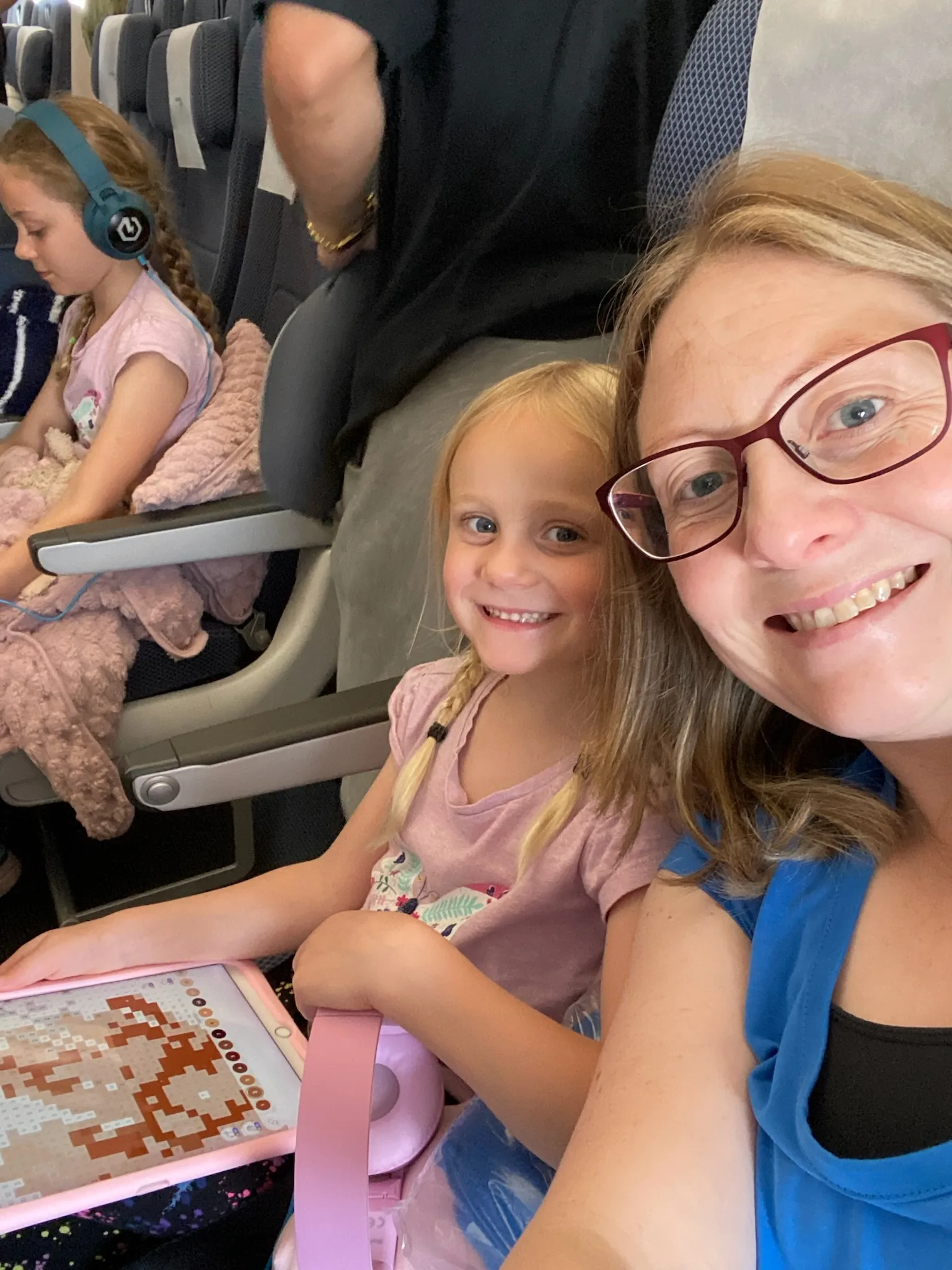 5 seats in a row, including a window seat