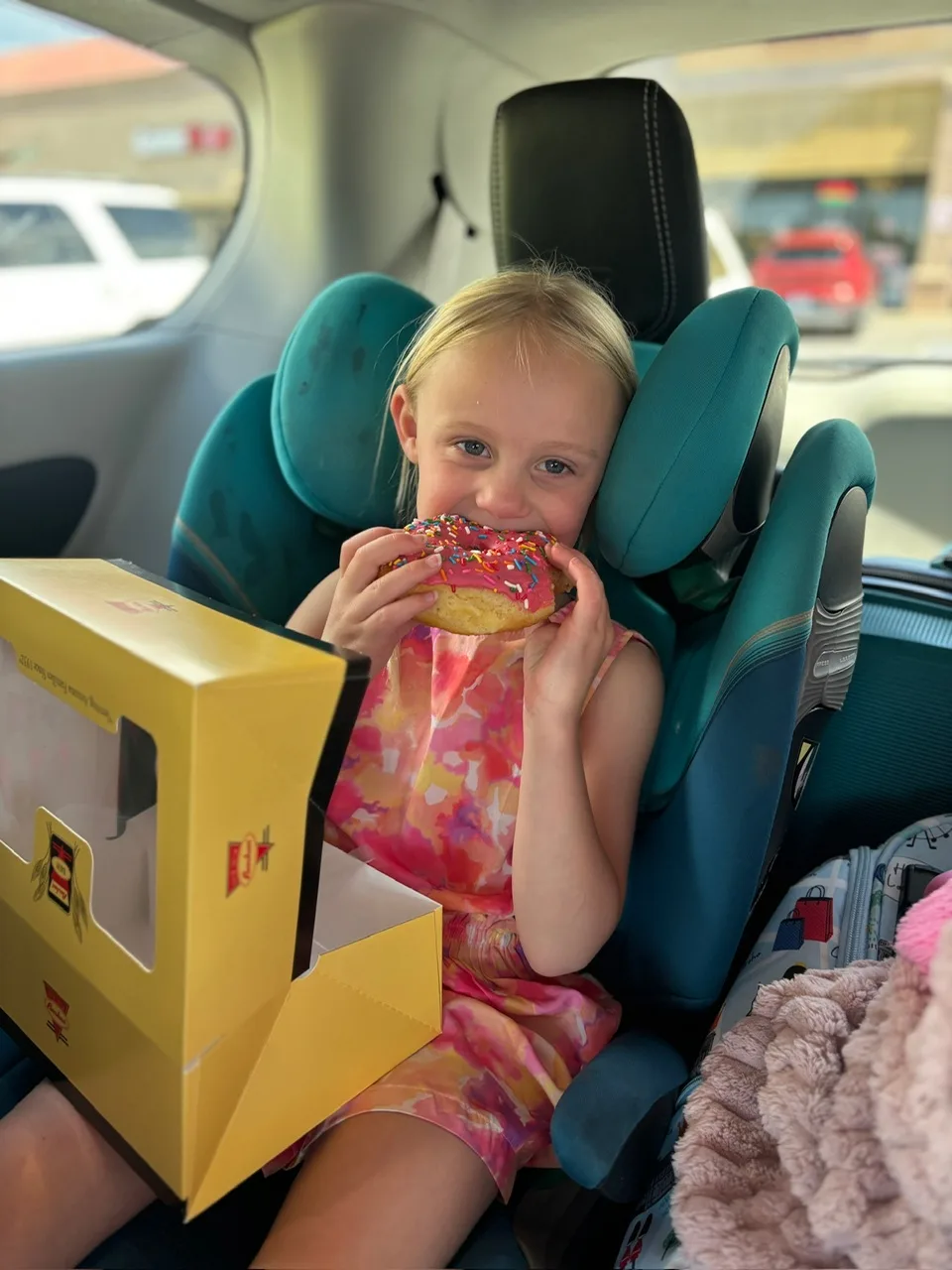 Thea tucking in to a proper American donut